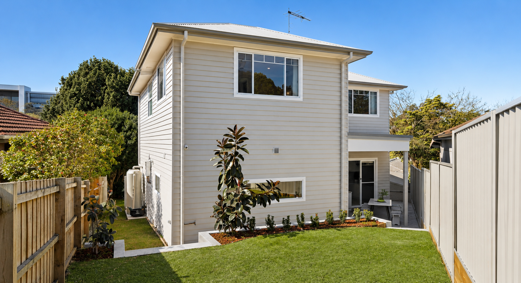 Vertical timber cladding installation on a Sydney residential home